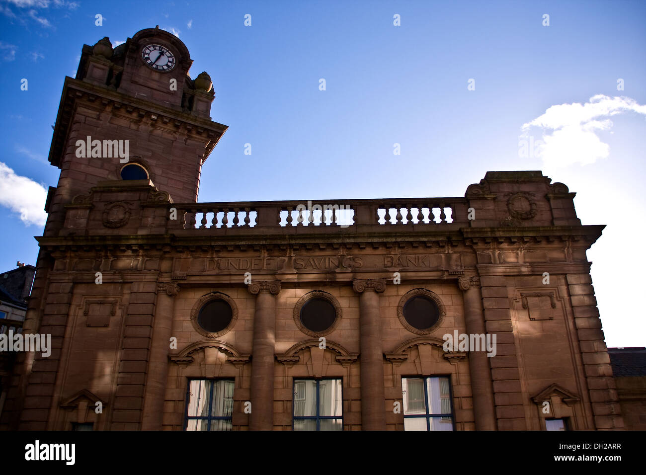 Dundee Savings Bank is a heavy Edwardian Baroque building with an oversize clock tower and was Built by David Baxter in 1914, UK Stock Photo