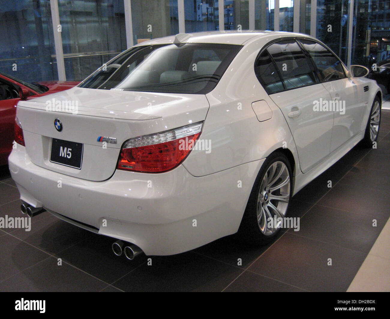 BMW M5 (E60): Front view, white color. Fourth generation. Made from 2005 to  2010 Stock Photo - Alamy