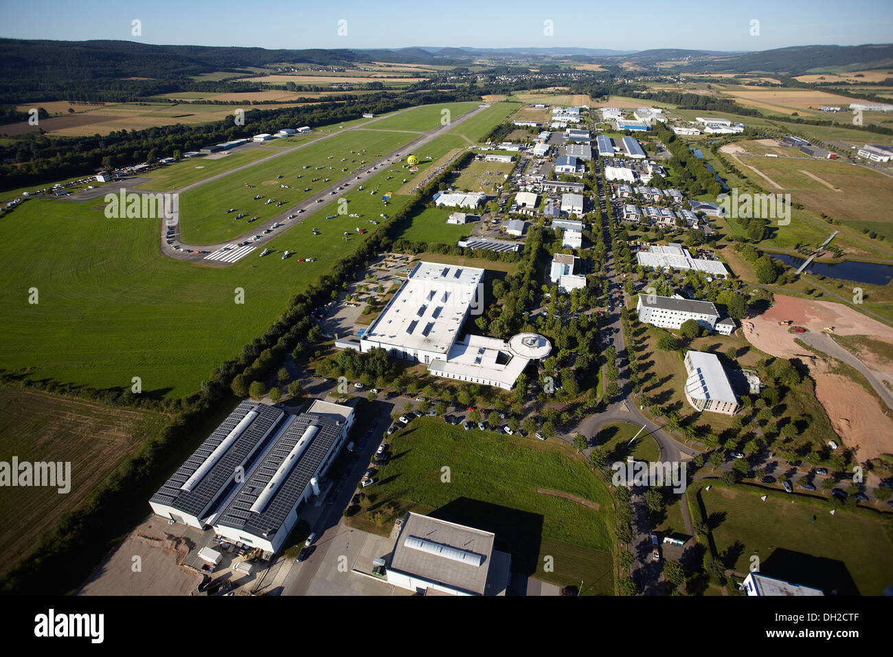 Aerial view, industrial park at Foehren airfield near Trier, Rhineland-Palatinate Stock Photo