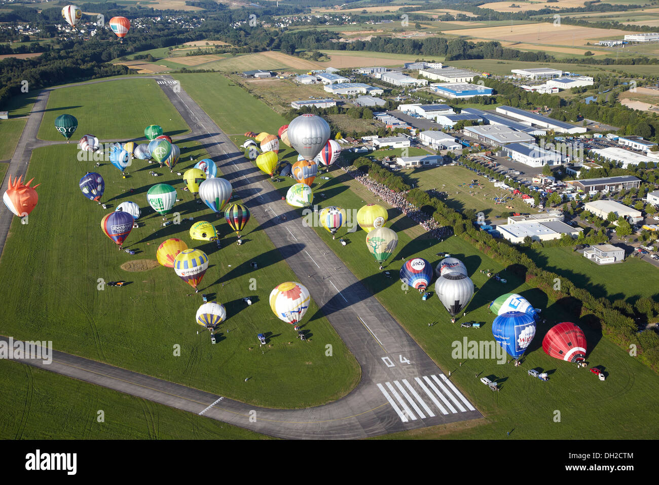 Aerial view, hot air balloon launch during the Mosel Ballon Fiesta, balloon festival, at Foehren airfield near Trier Stock Photo