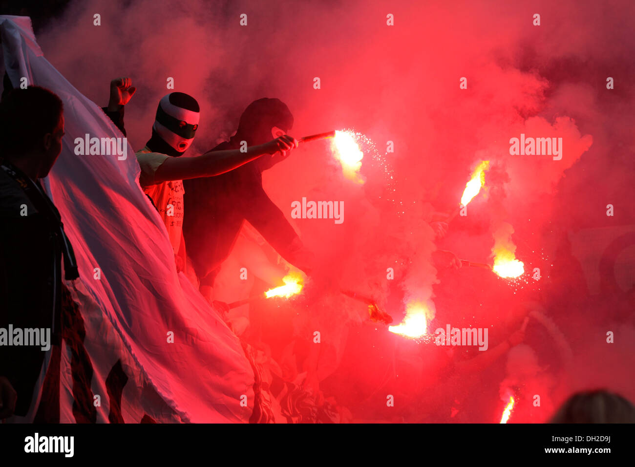 Gladbach fans lighting firecrackers, FSV Mainz 05 - Borussia Moenchengladbach, in the Coface Arena, Mainz, Rhineland-Palatinate Stock Photo