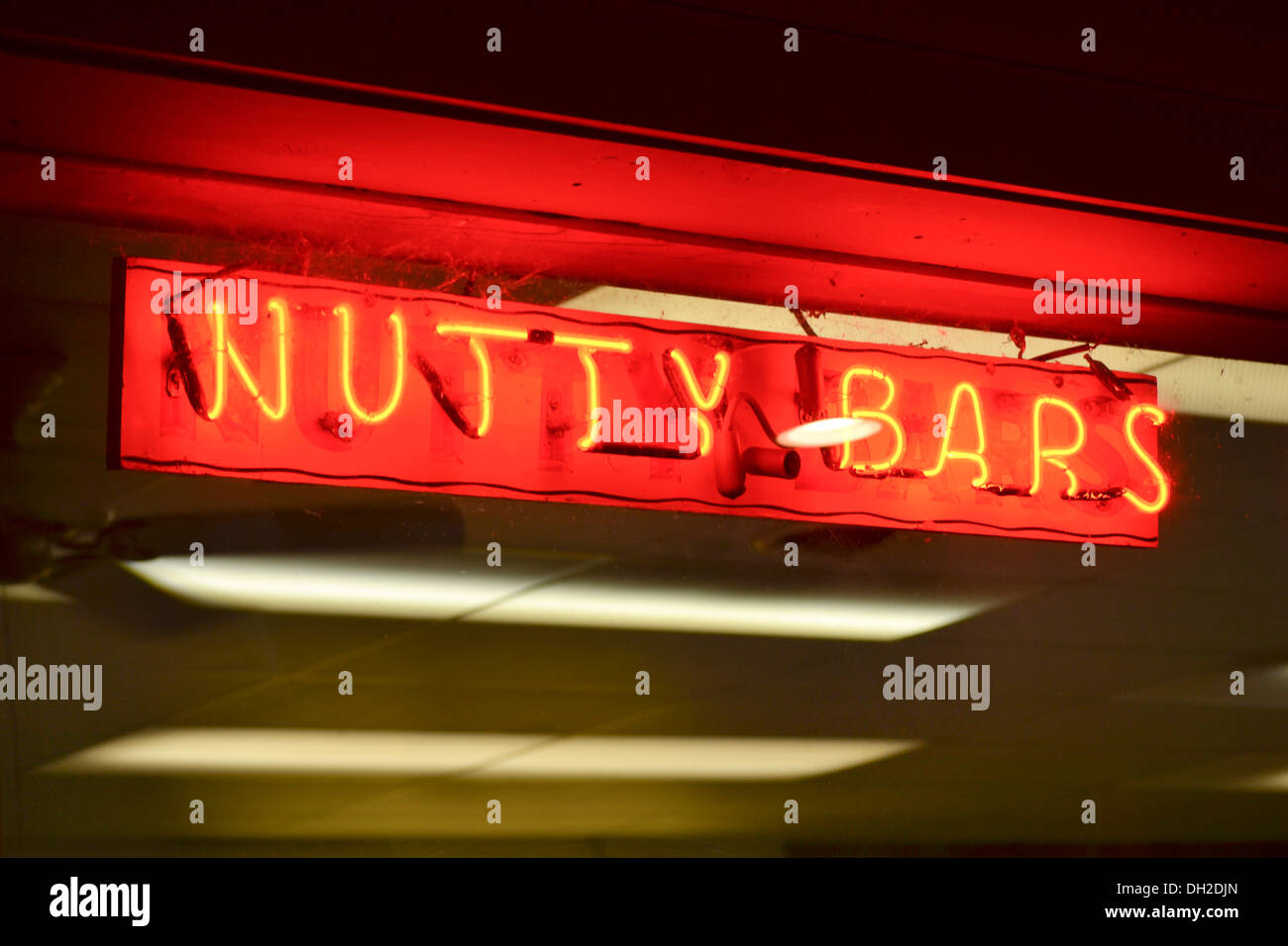 A local shop with neon signs Stock Photo Alamy