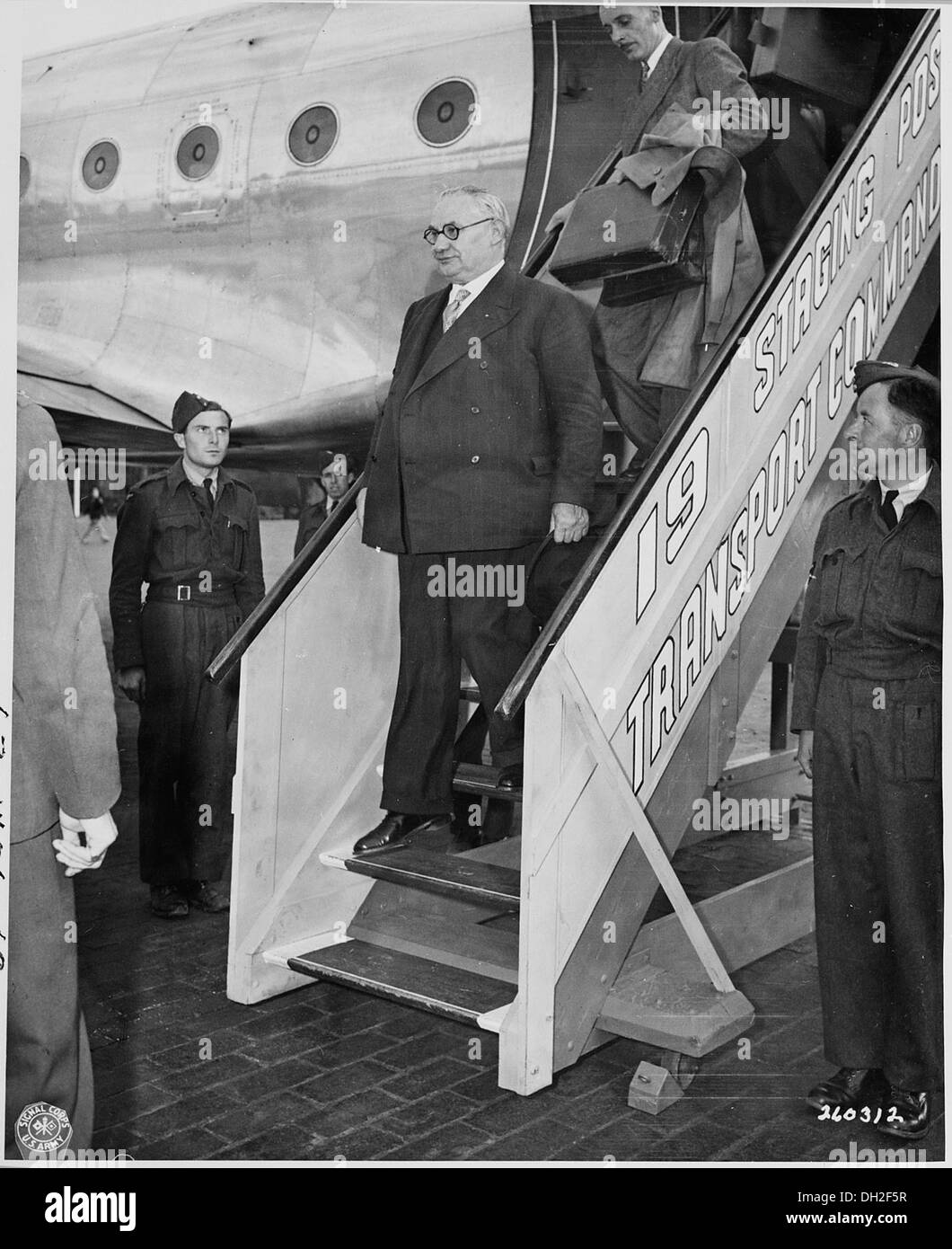 Ernest Bevin, British Minister for Foreign Affairs, arrives at Gatow Airport in Berlin, Germany to attend the Potsdam... 198916 Stock Photo