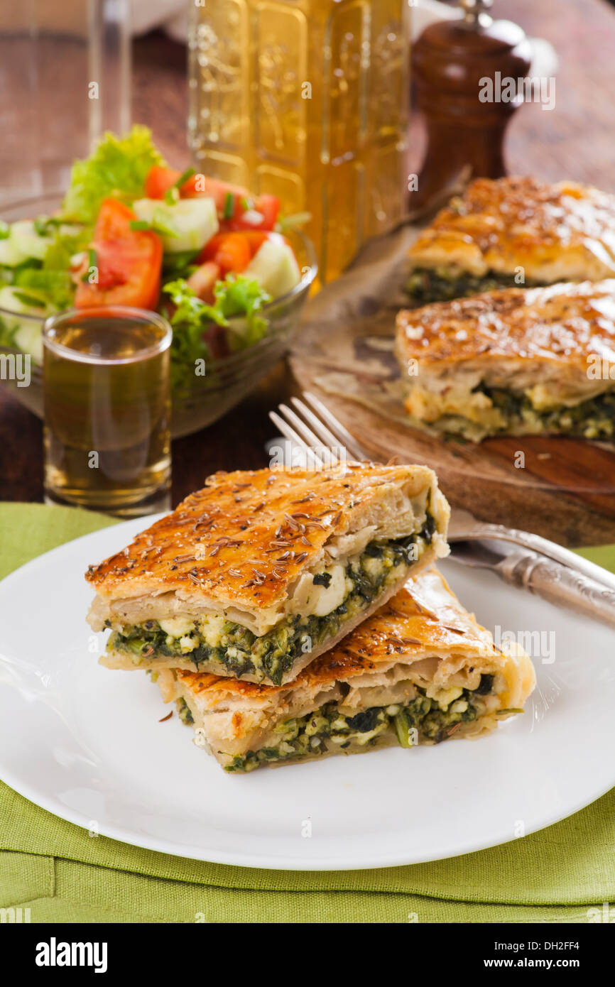 spinach pie on a white plate Stock Photo