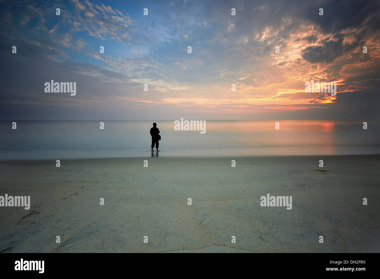 Beach at sunrise Stock Photo