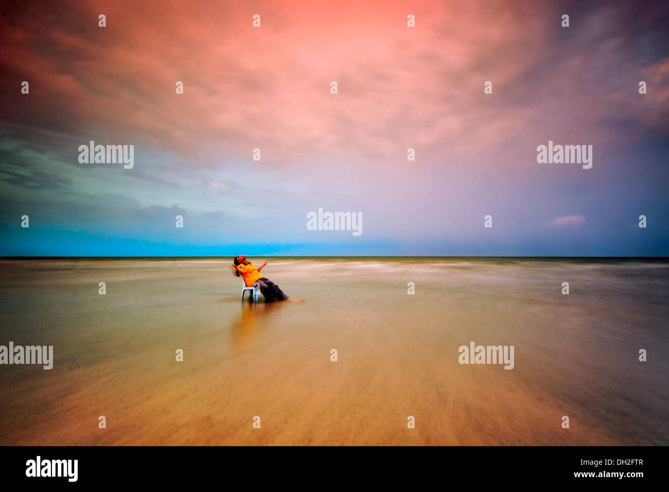 Beach at sunrise Stock Photo