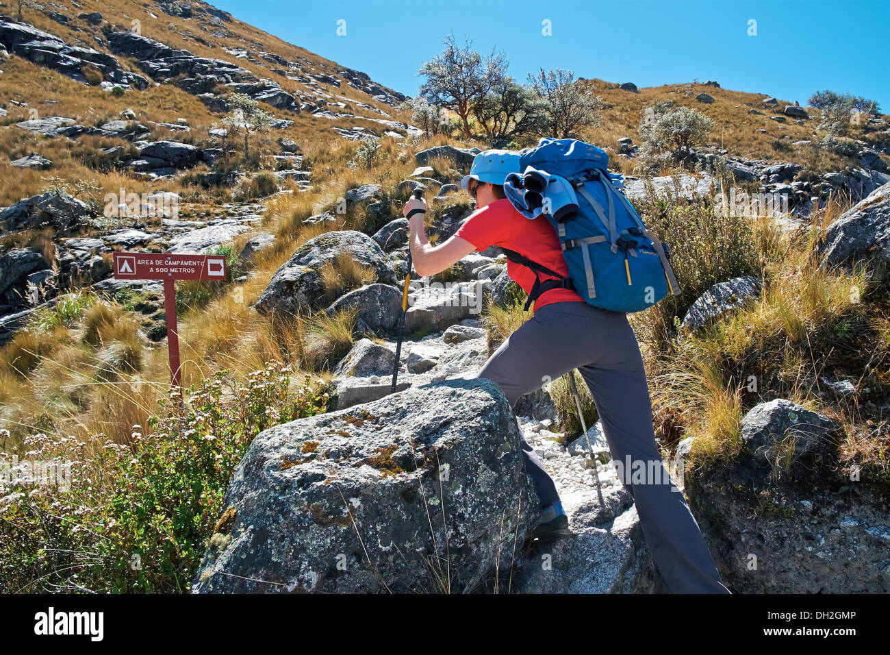 A hiker climbing Nev Churup trail, Huascaran National Park in the Andes, South America. Stock Photo