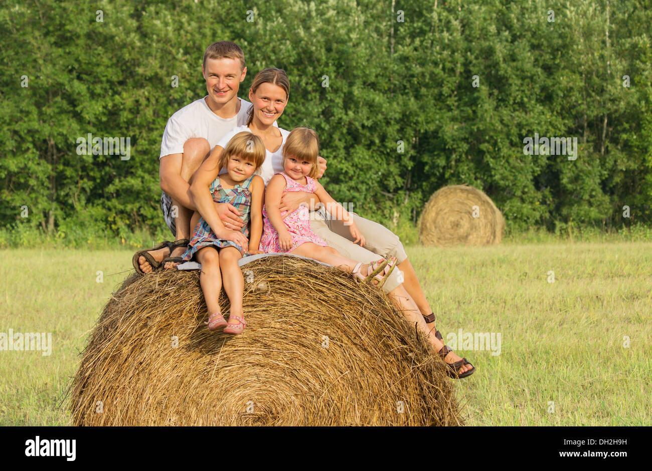 Happy family on vacation in summer day Stock Photo - Alamy