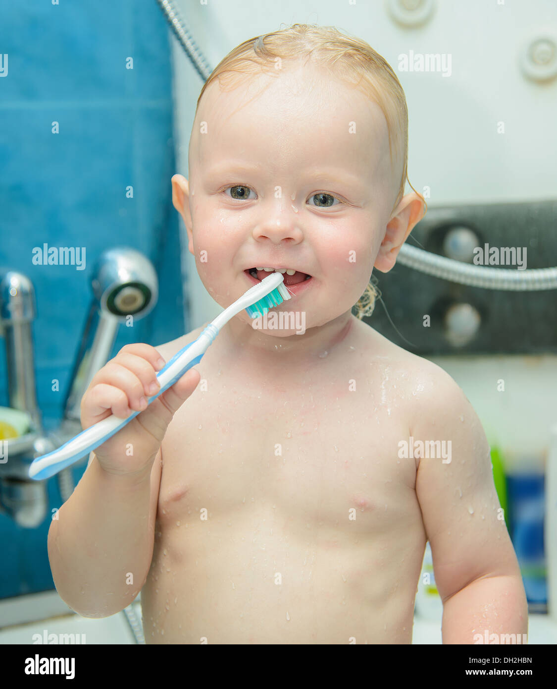 baby boy brushing his teeth Stock Photo Alamy