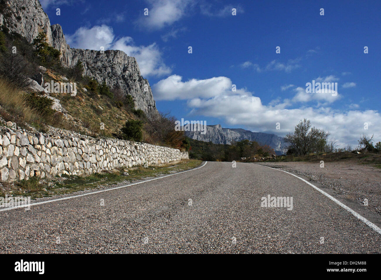 road in Crimean mountains at fall Stock Photo