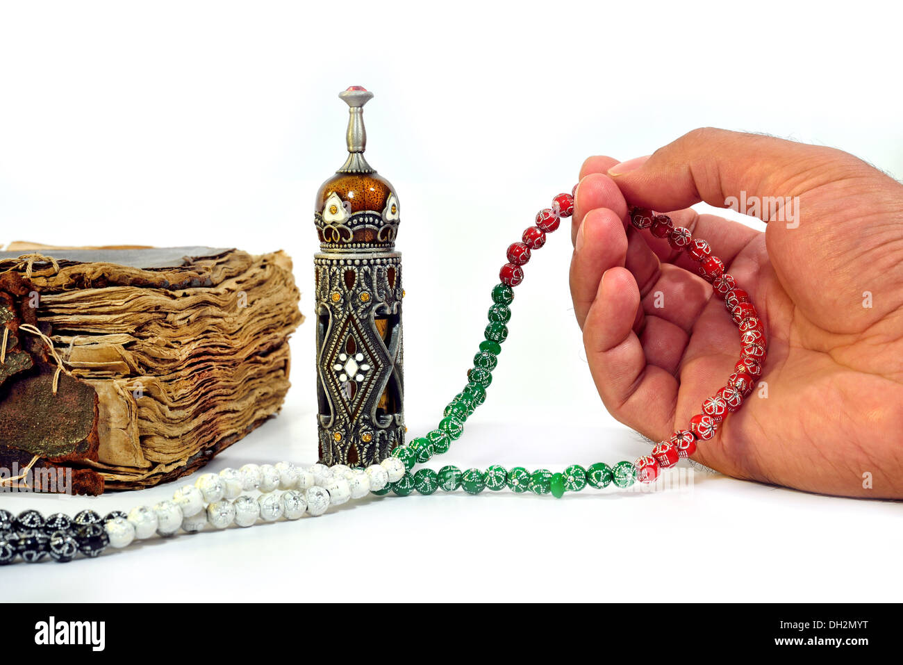 Muslim hand with prayer beads hi-res stock photography and images - Alamy