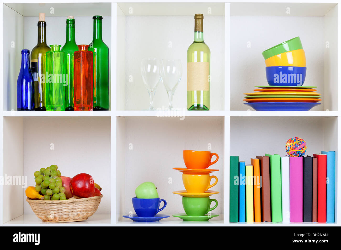 book shelf with bottles and books Stock Photo