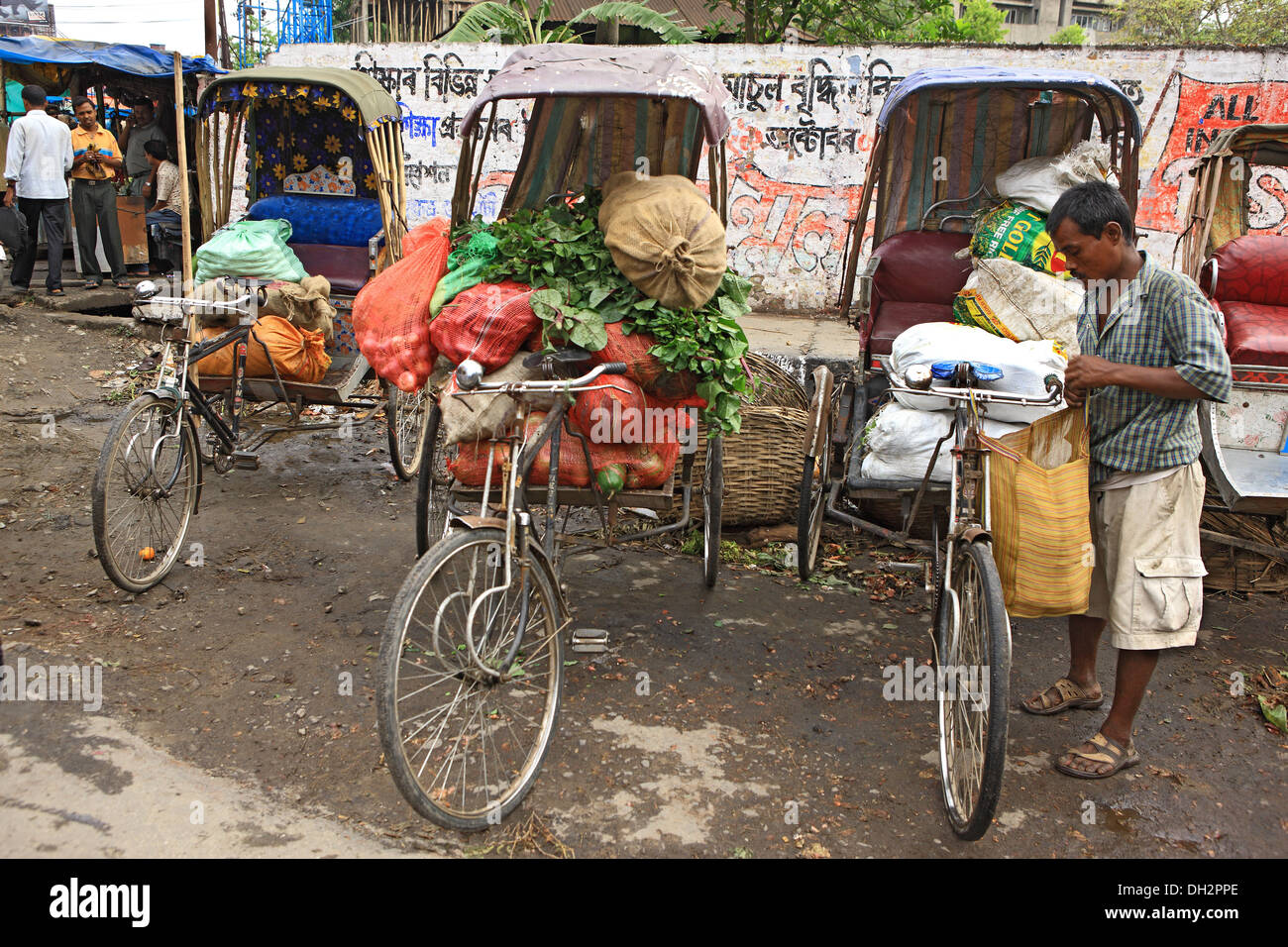 Tricycle Rickshaws in vegetable Market at guwahati assam India Asia ...