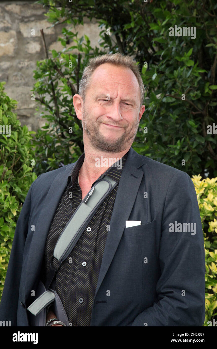 6th Angouleme French-Language Film Festival (Southwestern France): Benoît Poelvoorde posing during a photocall on 2013/08/24 Stock Photo