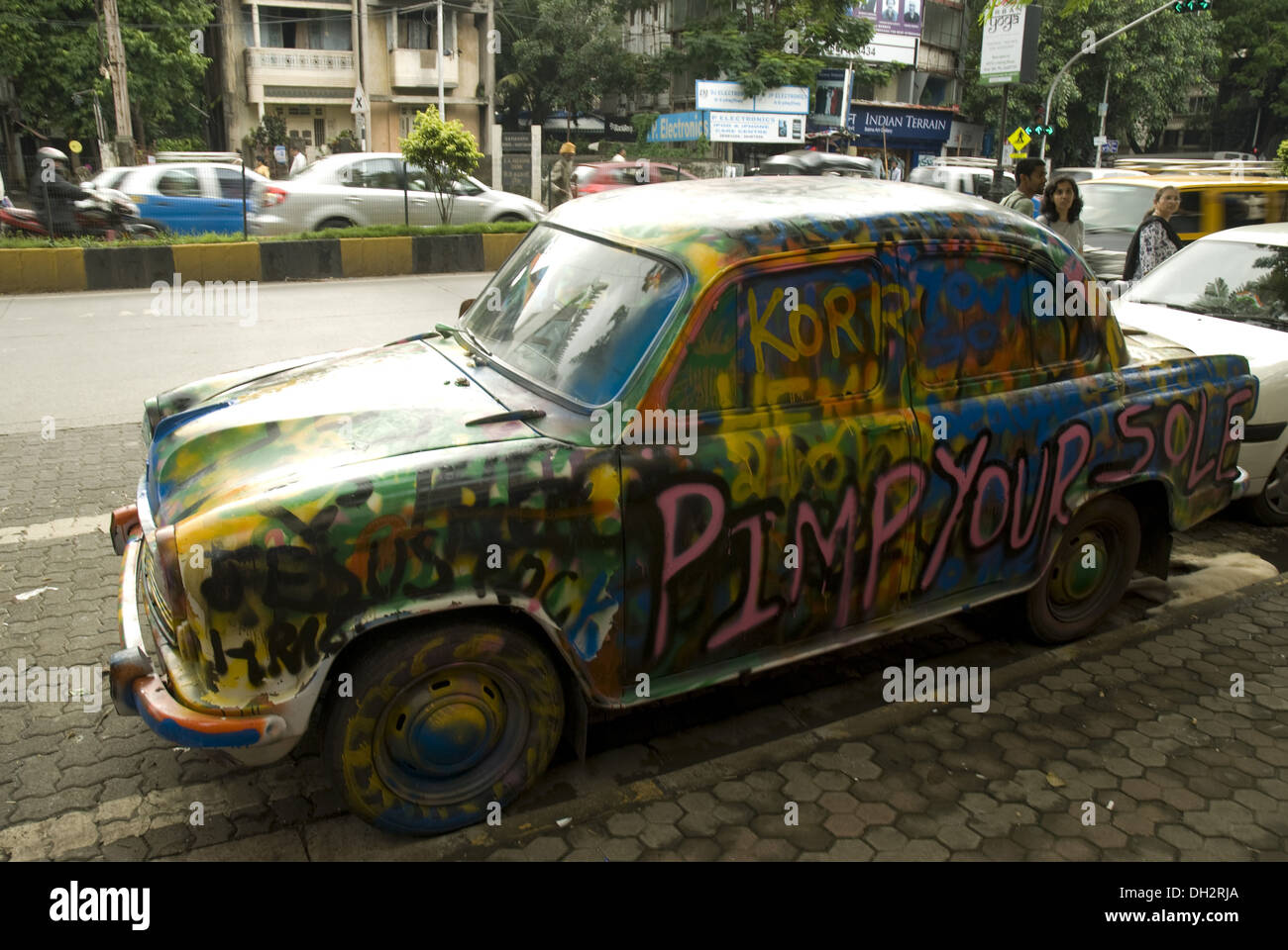 painted ambassador car at Linking Road Khar Mumbai Maharashtra India Stock Photo