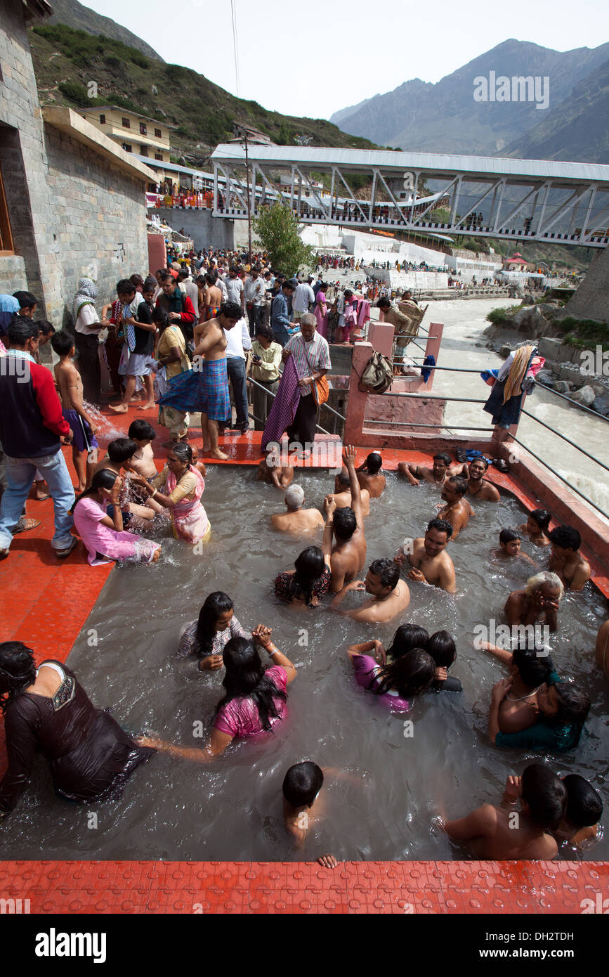 people bathing in hot water spring badrinath Uttarakhand India Asia