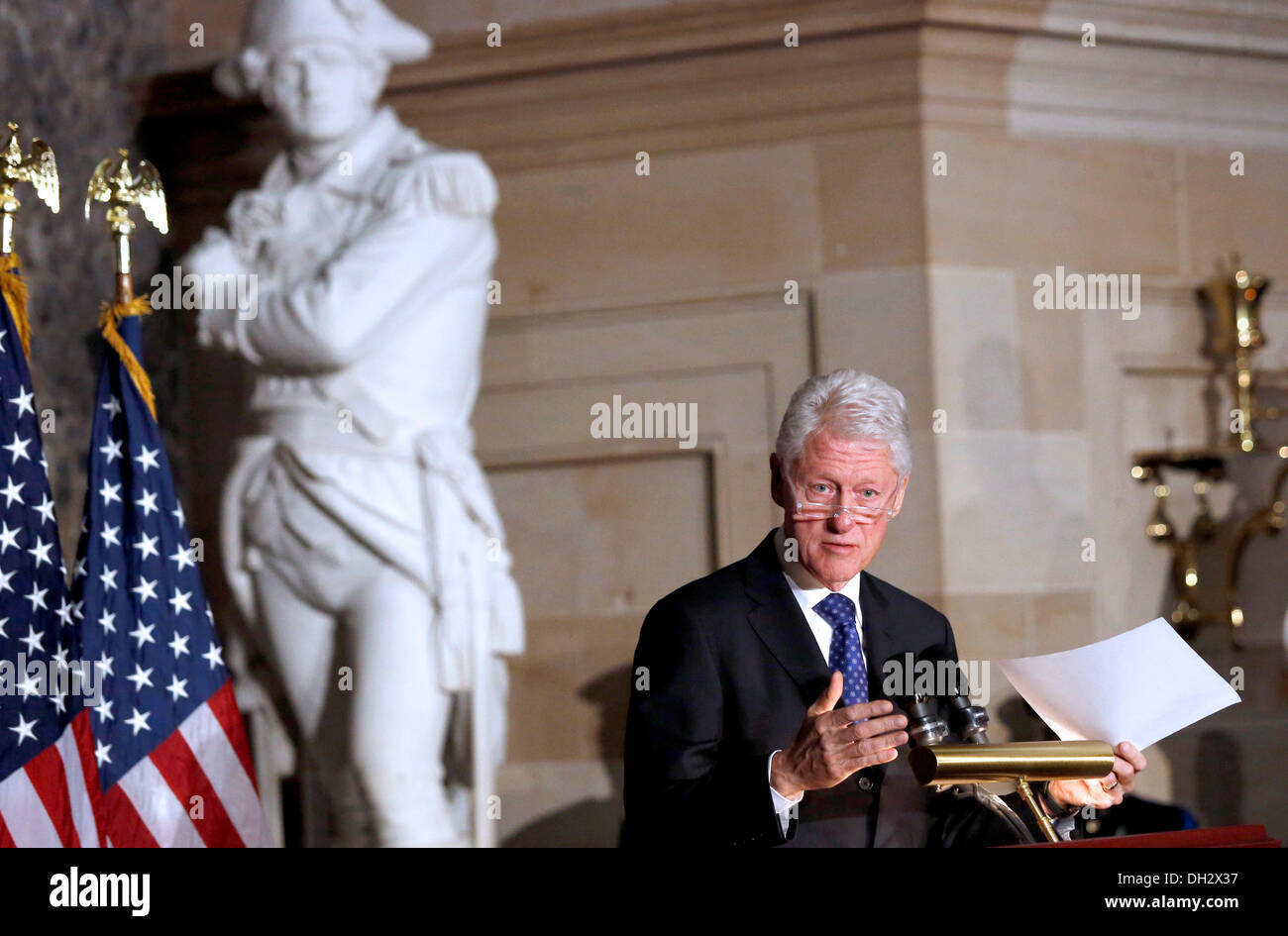 Former United States President Bill Clinton delivers a tribute during a memorial service honoring former Speaker of the U.S. House Thomas S. Foley (Democrat of Washington) in the U.S. Capitol in Washington, DC on October 29, 2013. Foley represented Washington's 5th Congressional District was the 57th Speaker of the US House of Representatives from 1989 to 1995. He later served as US Ambassador to Japan from 1997 to 2001. Credit: Aude Guerrucci / Pool via CNP Stock Photo