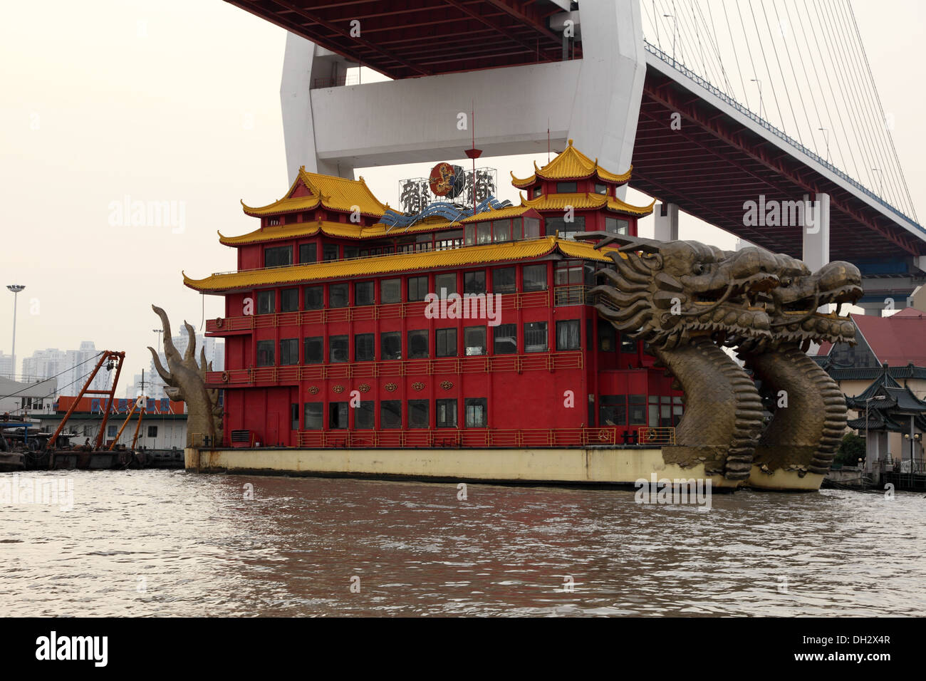 Dragon ship restaurant on Huangpu river in Shanghai, China Stock Photo