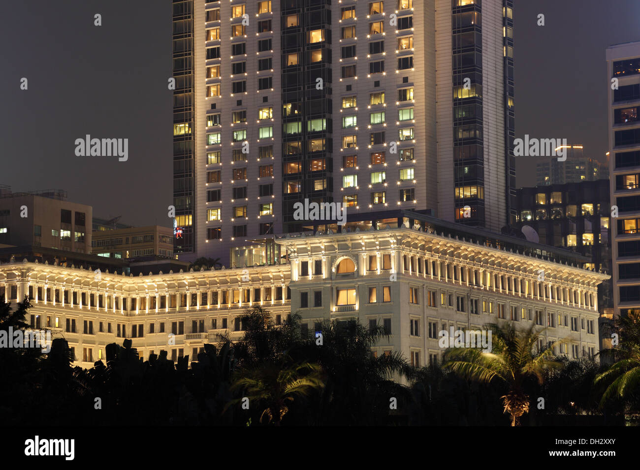 Buildings in Hong Kong Kowloon illuminated at night Stock Photo - Alamy