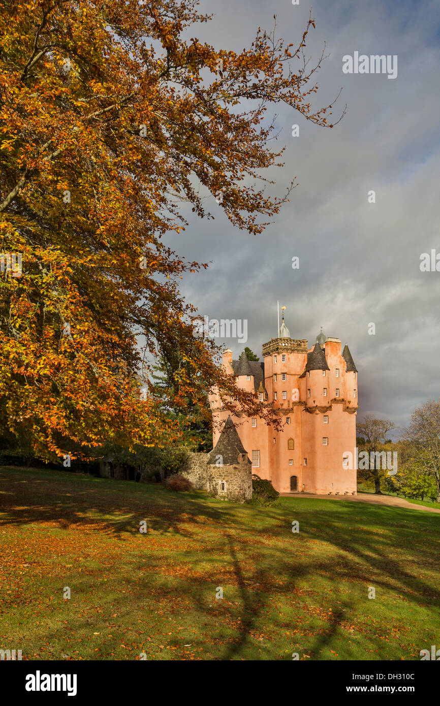 CRAIGIEVAR CASTLE IN AUTUMN WITH BEECH TREE AND LEAVES ABERDEENSHIRE SCOTLAND Stock Photo