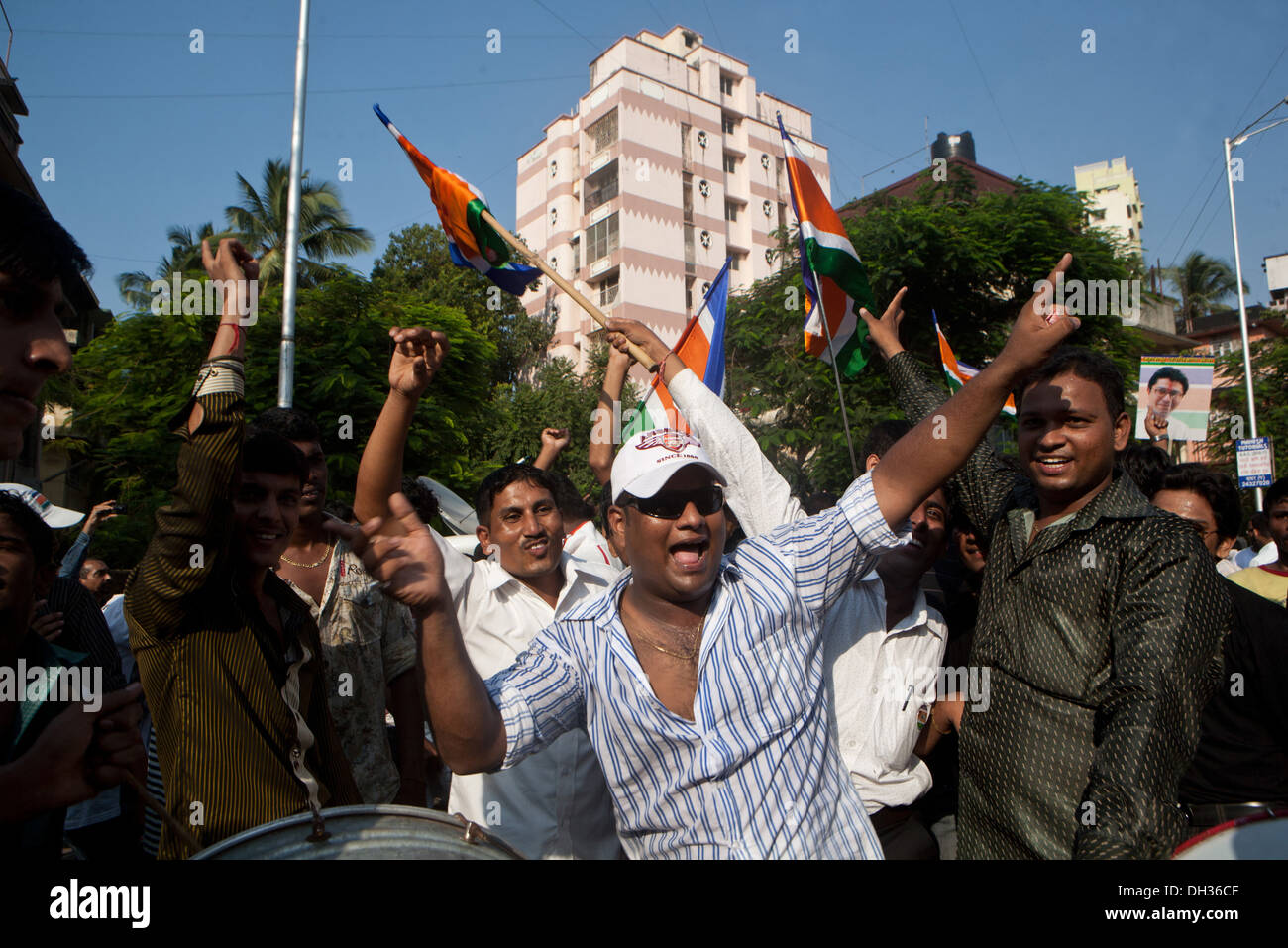 men supporters shouting slogans celebrating election victory of MNS political candidate Mumbai Maharashtra India Asia Stock Photo