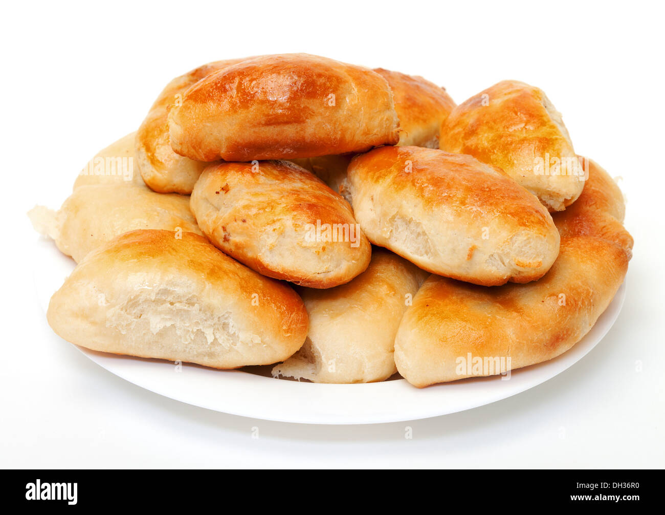 Heap baked patties on plate Stock Photo