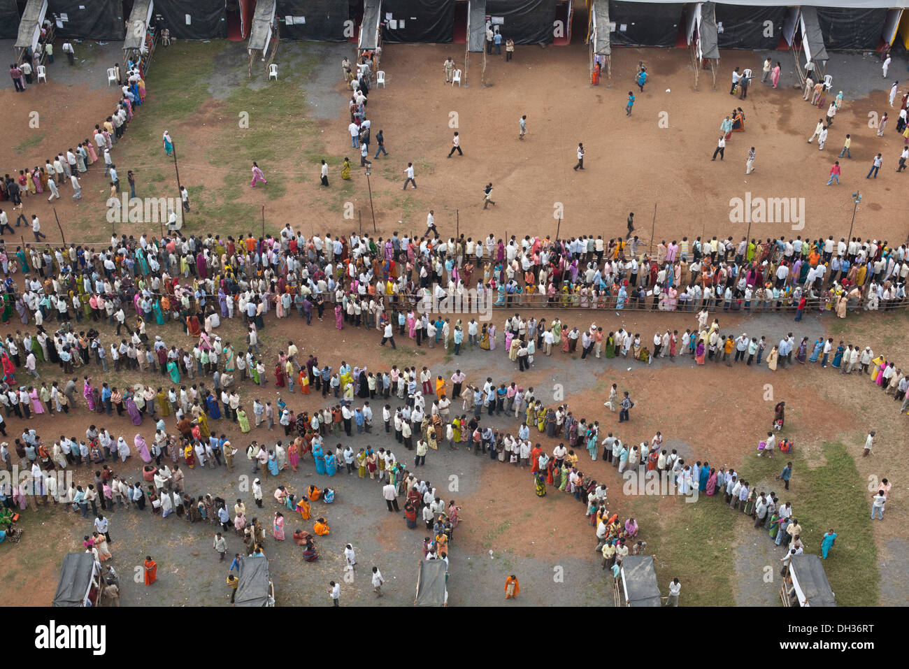 Crowd of people queue for voting at election polling station Bombay Mumbai Maharashtra India Asia Stock Photo