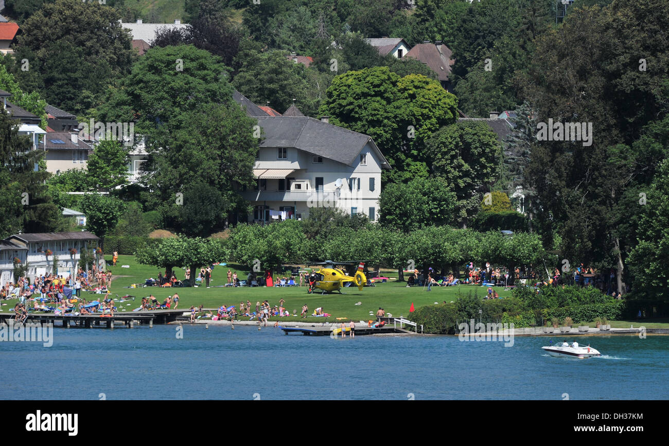 A air ambulance lands at the popular holiday resort of Velden am Worthersee in Austria Stock Photo