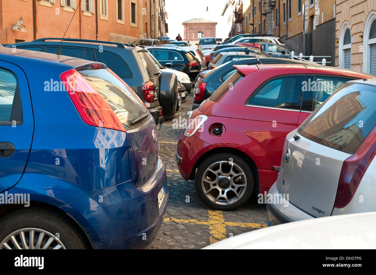 Tightly parked cars in central Rome, Italy Stock Photo