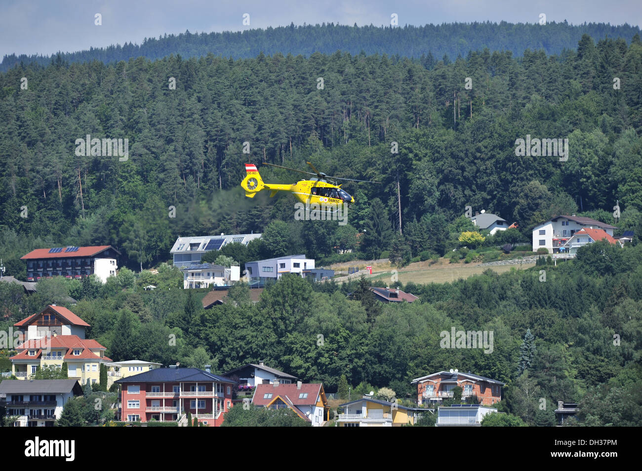 A rescue medical helicopter comes in to land at  Velden am Worthersee in Austria Stock Photo