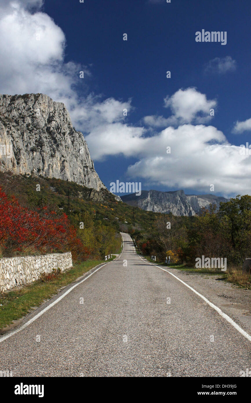road in Crimean mountains at fall Stock Photo