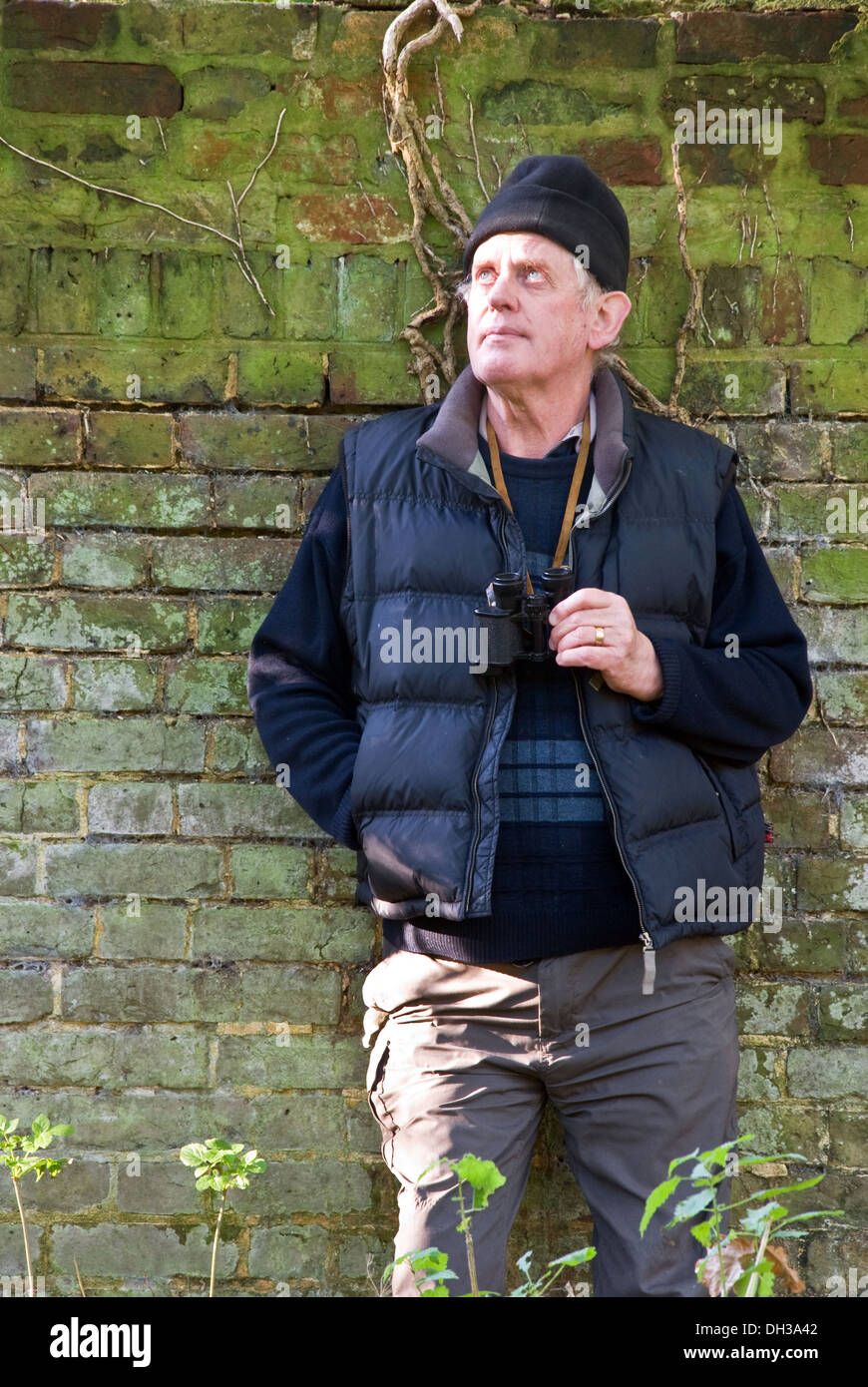 Mature male man standing wall hi-res stock photography and images - Alamy