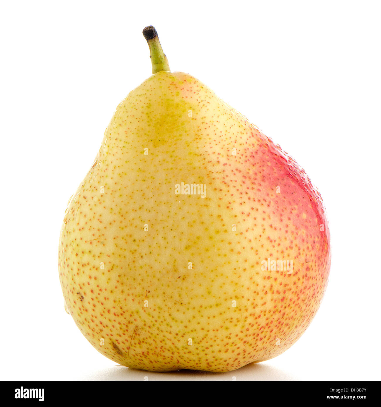 A Ripe Paer Single ripe pear isolated on white background Stock Photo - Alamy