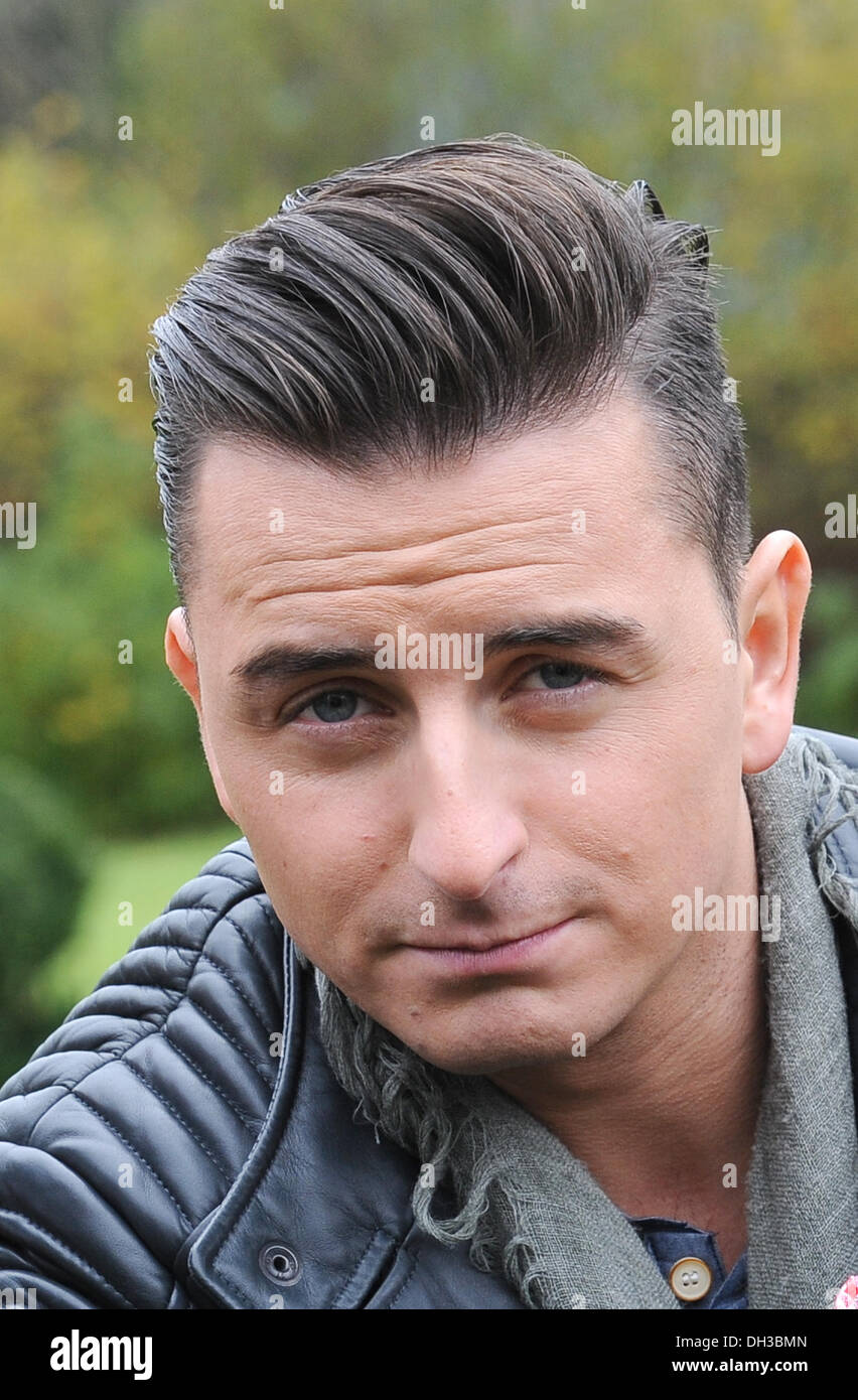 Oberaudorf, Germany. 30th Oct, 2013. Austrian singer Andreas Gabalier poses in his first film role as pop musician Fabrizio Frey during a break at the set for the 300th episode of the ZDF crime series 'Die Rosenheim-Cops' at the Reisach cloister near Oberaudorf, Germany, 30 October 2013. Photo: Ursula Dueren/dpa/Alamy Live News Stock Photo