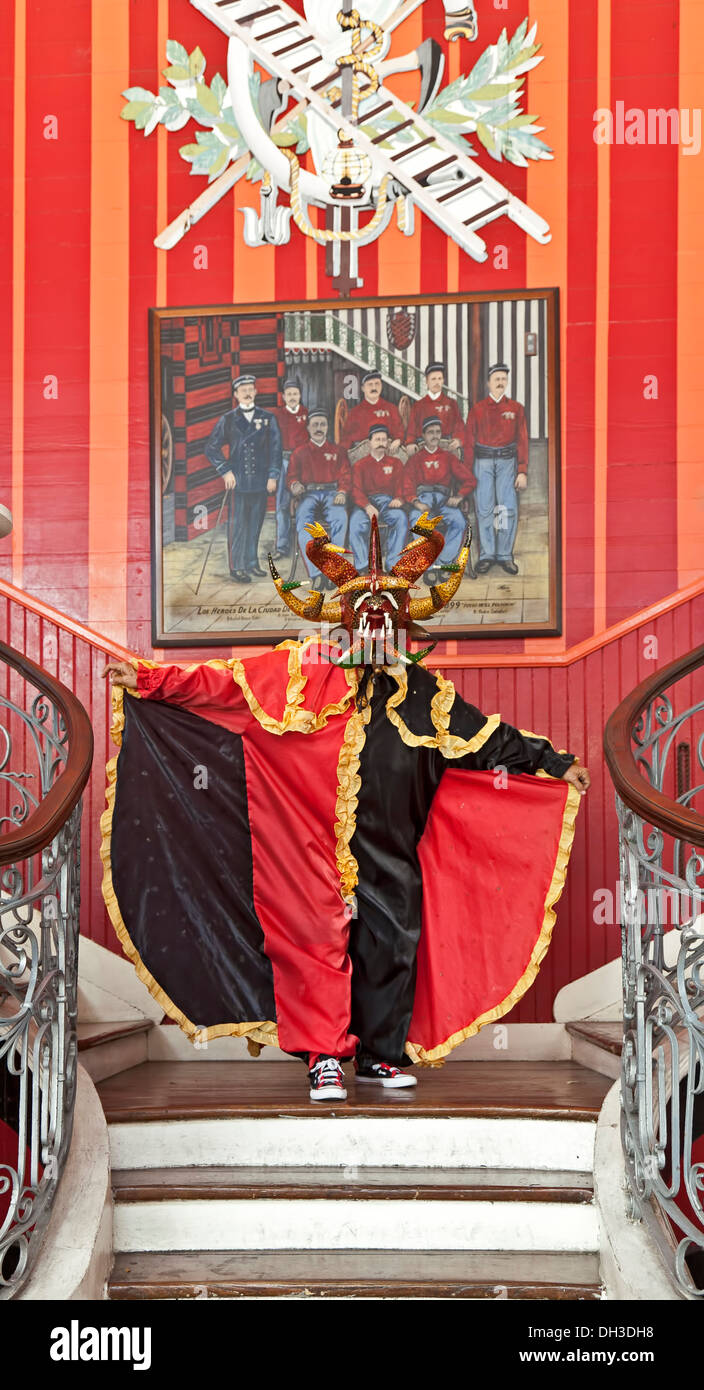 Vejigante on historic firehouse stairs, Ponce, Puerto Rico Stock Photo