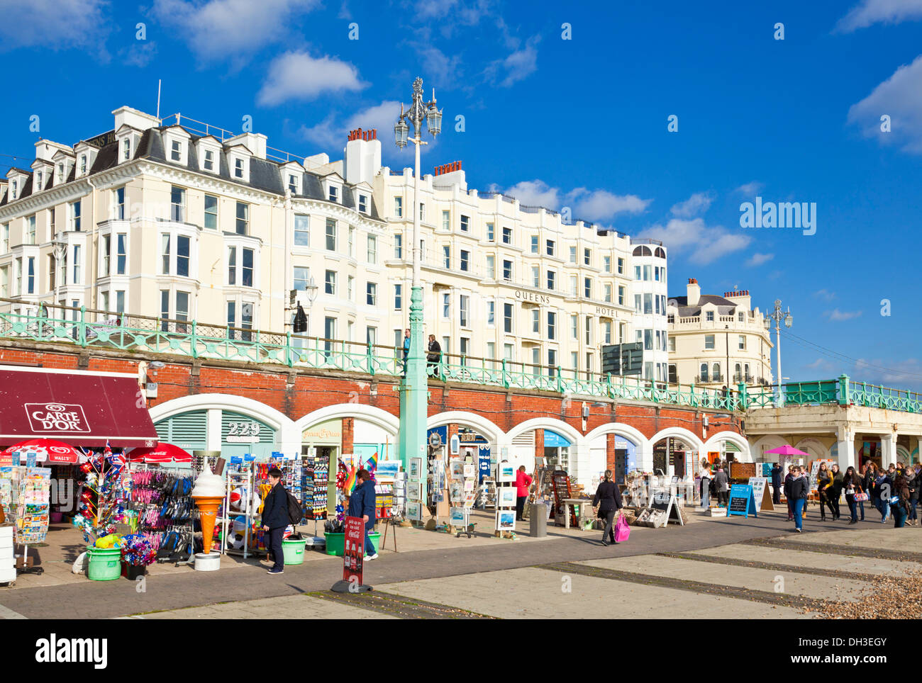 The seafront and beach cafes on Brighton promenade close to the Beach Brighton West Sussex England UK GB EU Europe Stock Photo
