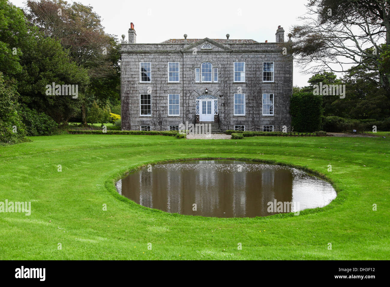 The house and pond or pool at Bonython Estate Gardens, Garden, Helston, Cornwall, England, UK Stock Photo