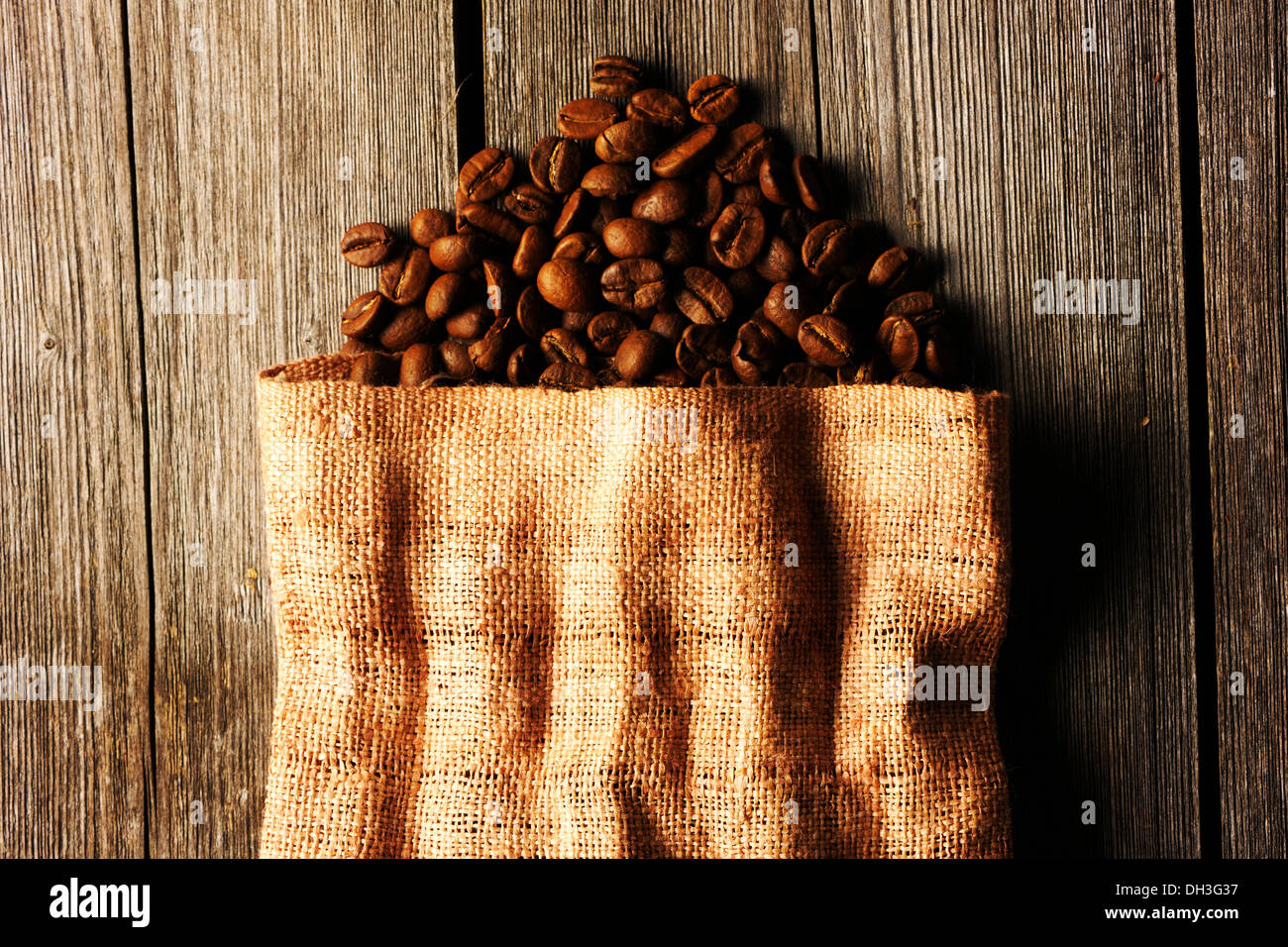 Coffee beans in bag background Stock Photo - Alamy
