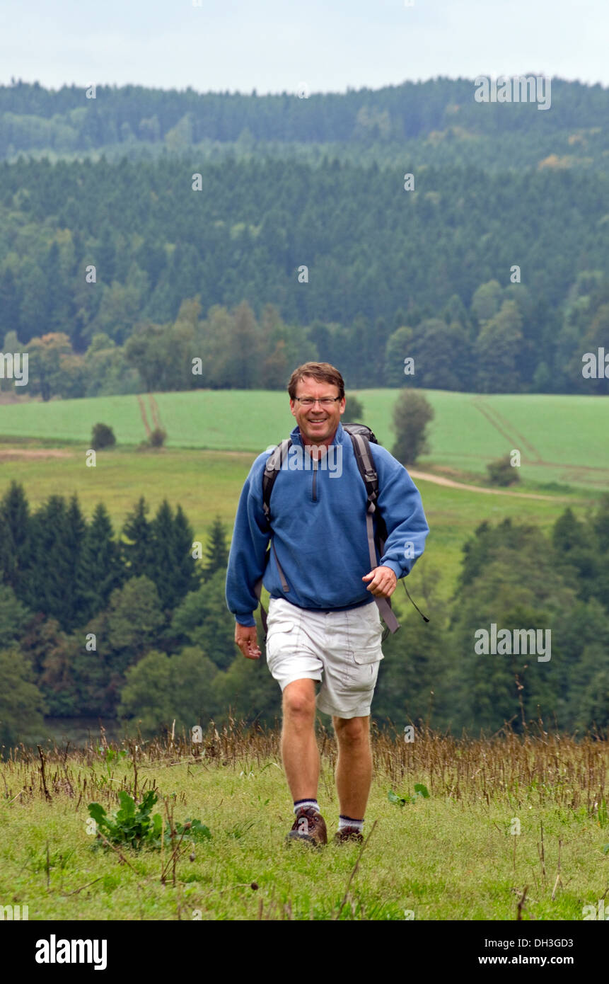 A male hiker in the country side of the Czech Republic Stock Photo