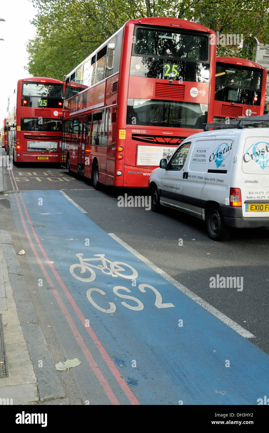 CS2 Barclays Cycle Superhighway Route Two with bus traffic jam ahead, Bow Road, London Borough of Tower Hamlets, England, UK Stock Photo