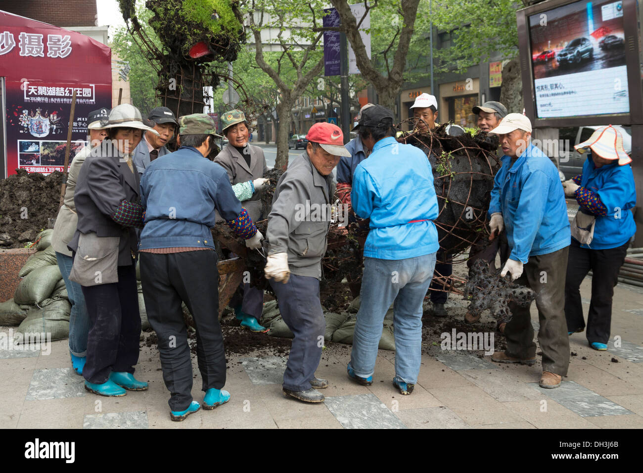 Shanghai China gang of workers removing iron structure for disposal Shanghai Stock Photo