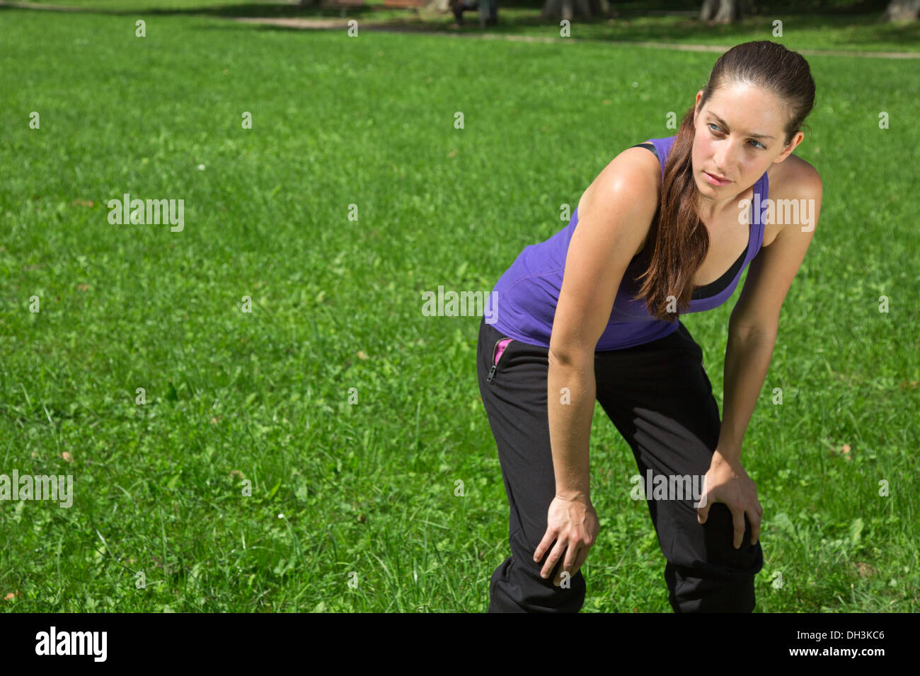 A young woman takes a break after sports or running Stock Photo - Alamy