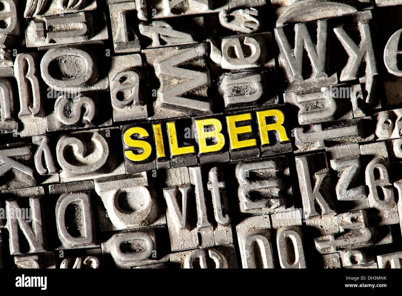 Old lead letters forming the word 'SILBER', German for 'SILVER' Stock Photo