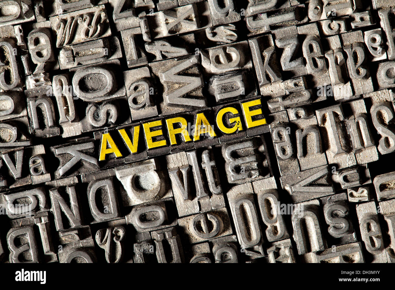 Old lead letters forming the word 'average' Stock Photo