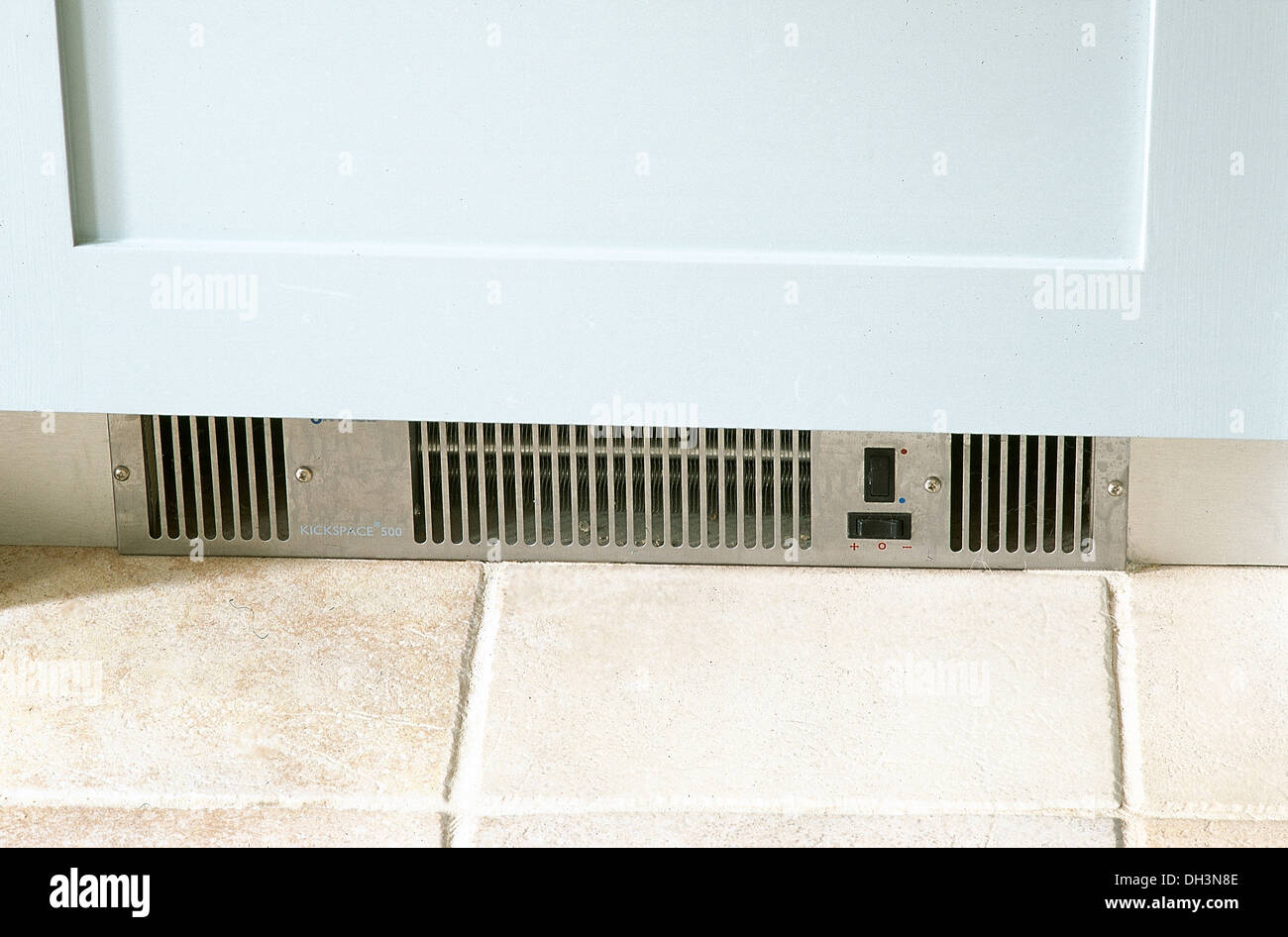 Closeup of under cupboard heating ventilation unit Stock Photo Alamy