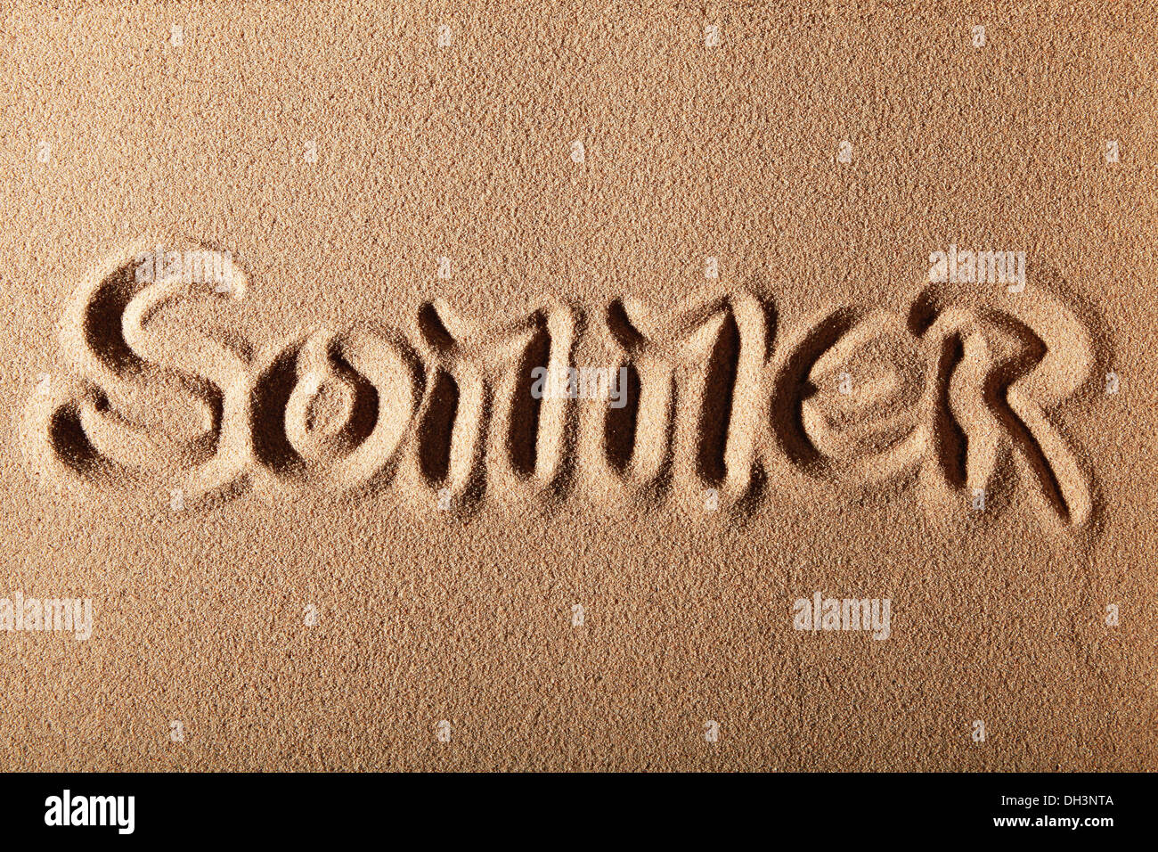 Writing in the sand "SOMMER" or "SUMMER Stock Photo Alamy
