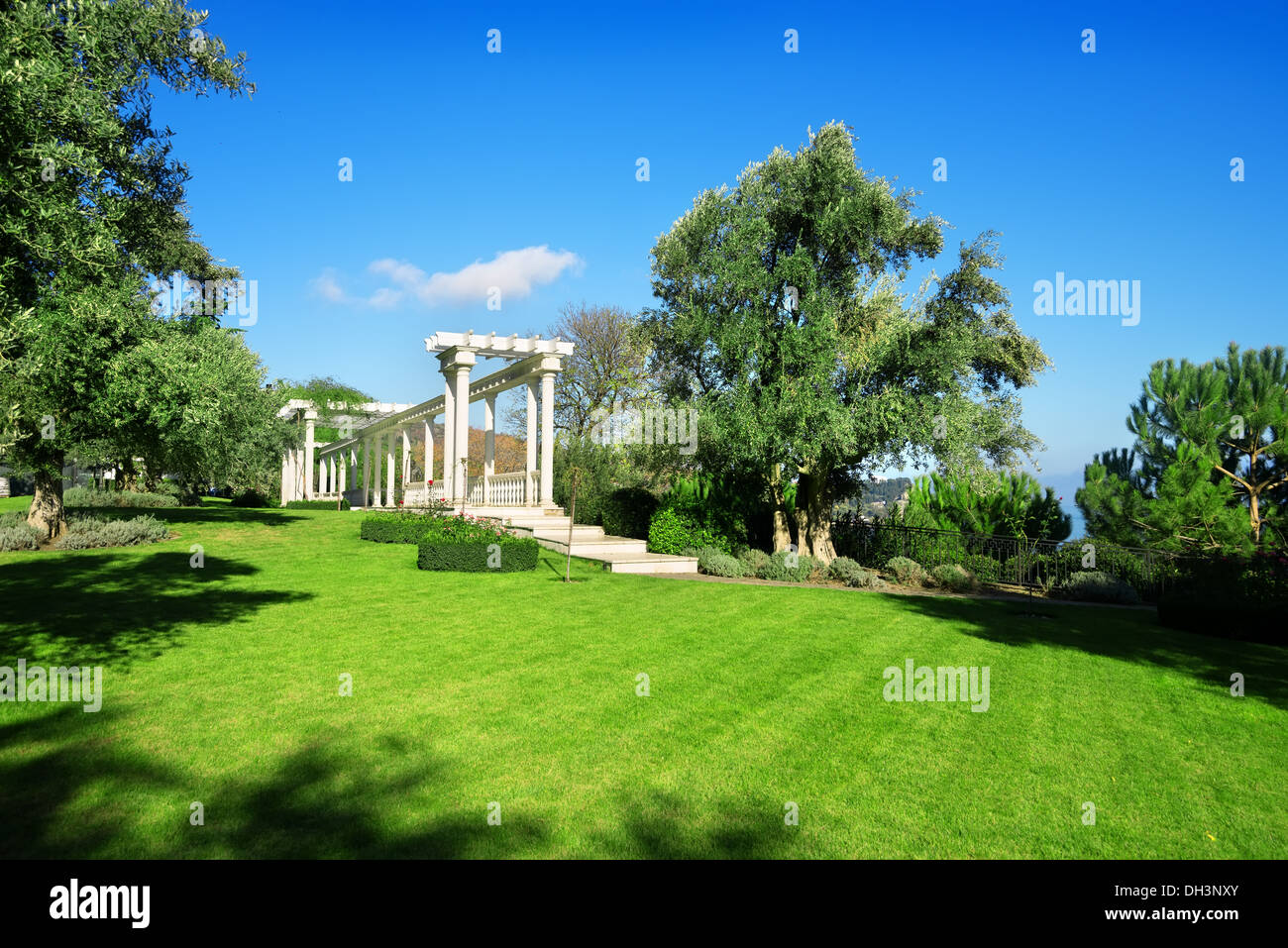 White balustrade with columns in a city park Stock Photo