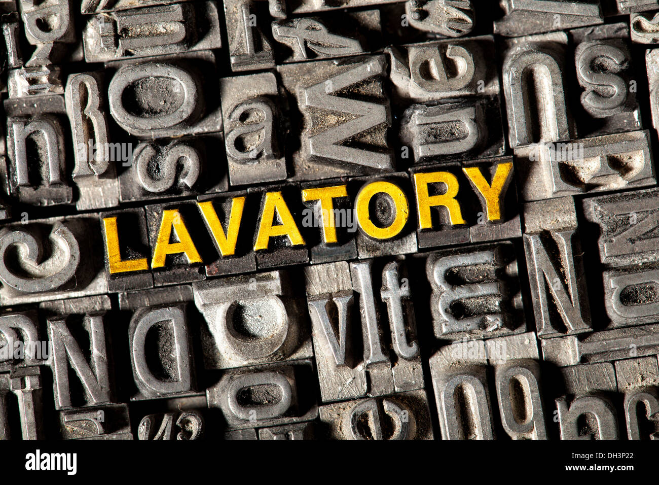 Old lead letters forming the word 'LAVATORY' Stock Photo