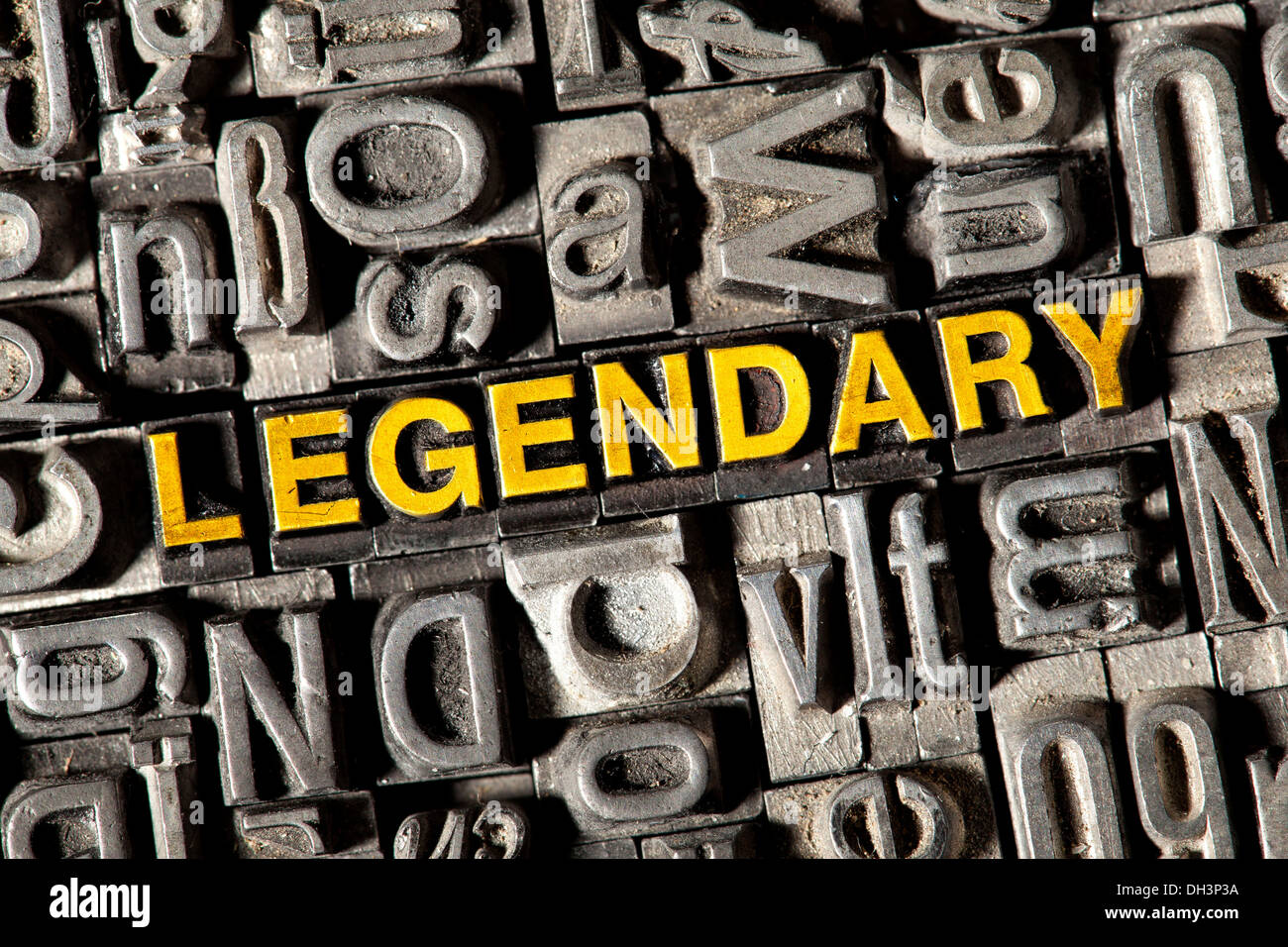 Old lead letters forming the word 'LEGENDARY' Stock Photo