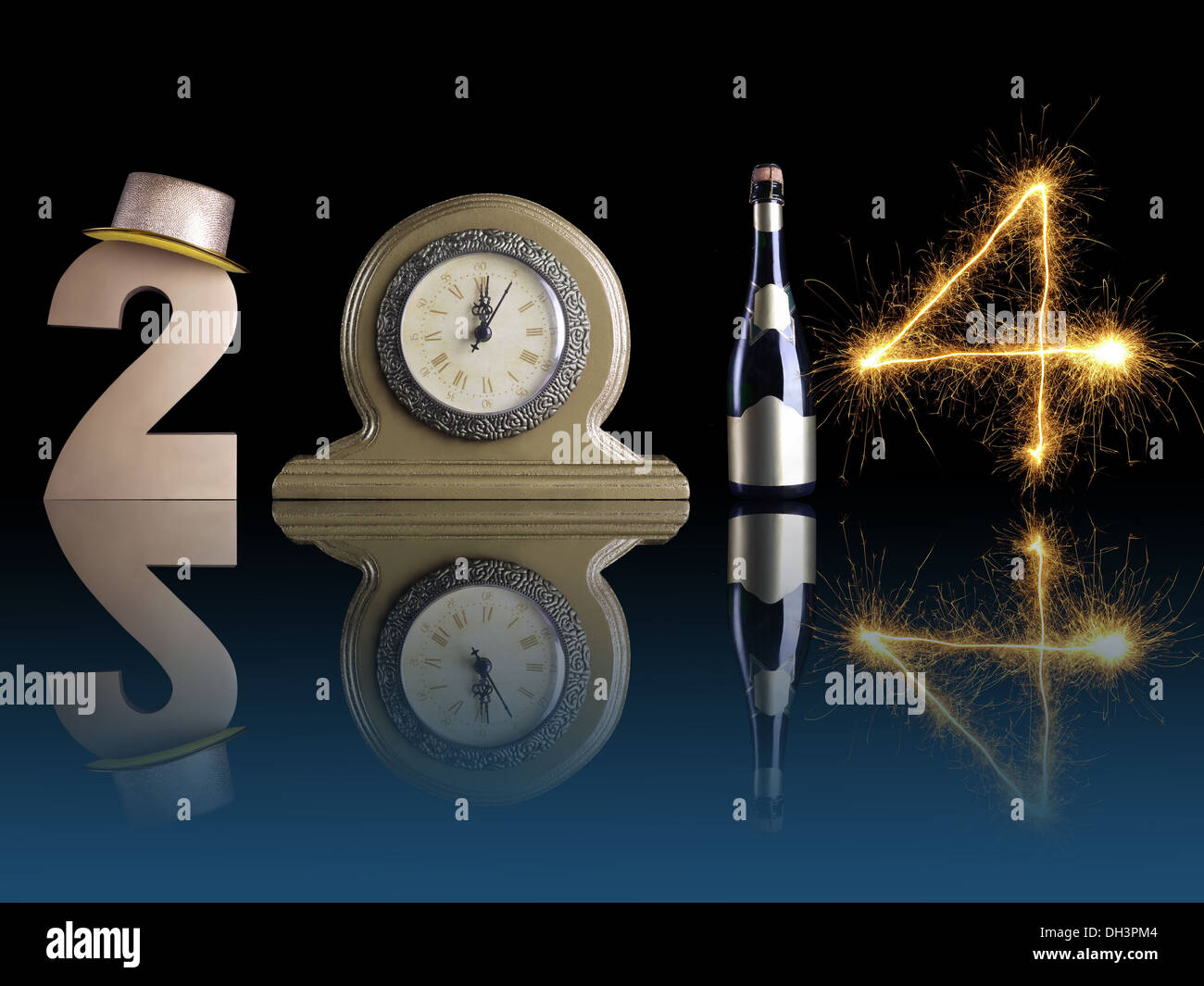 New Year 2014 set up of golden digit two, table clock, bottle of champagne and digit four created from burning sparkler Stock Photo